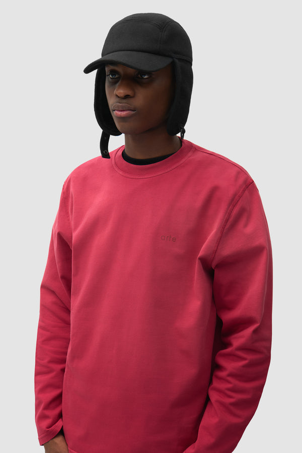 Sherpa Hunter Cap in Black worn by a model, half-body front view