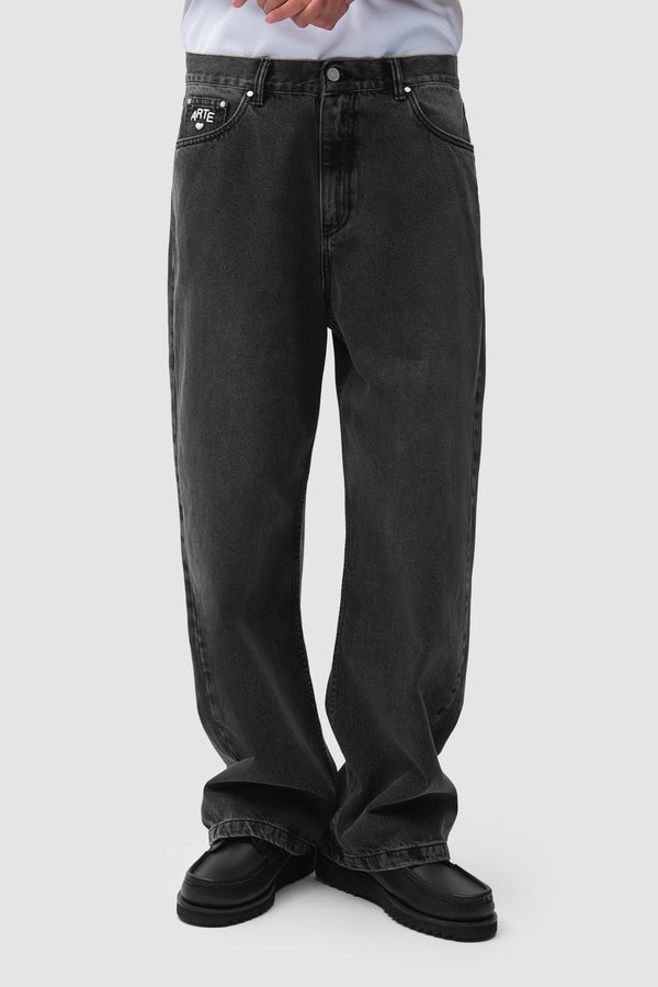 Cor Uniform Denim Pants in Black worn by a model, half-body front view
