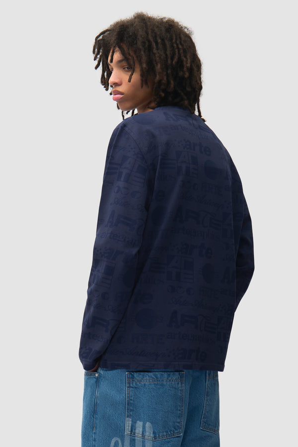 Polygraphic Longsleeve in Navy/Black worn by a model, half-body back view