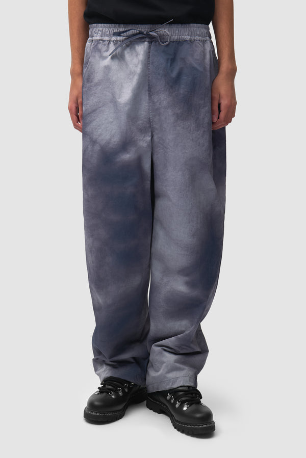 Sunfade Aero Track Pants in Navy worn by a model, half-body front view