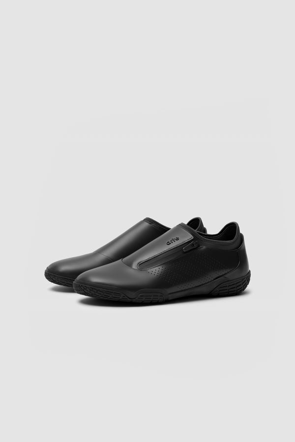 Arte for adidas Trivela in Core Black, front side view