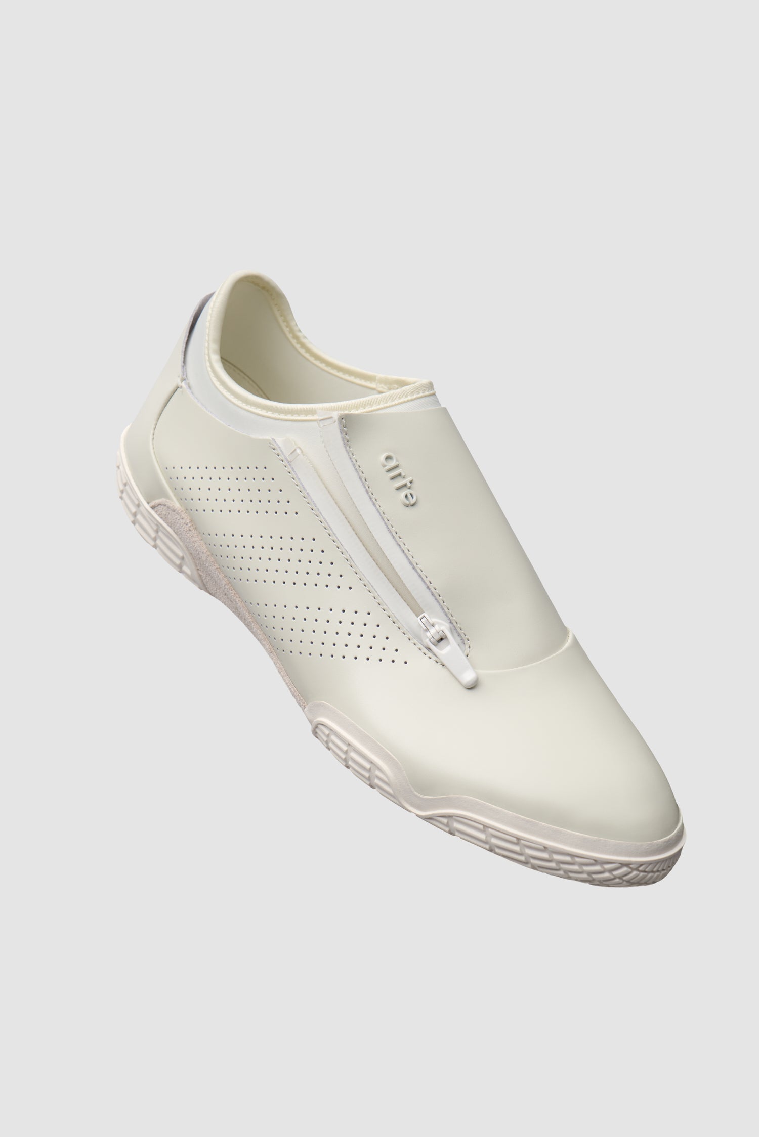 Arte for adidas Trivela in Off White, side angle view