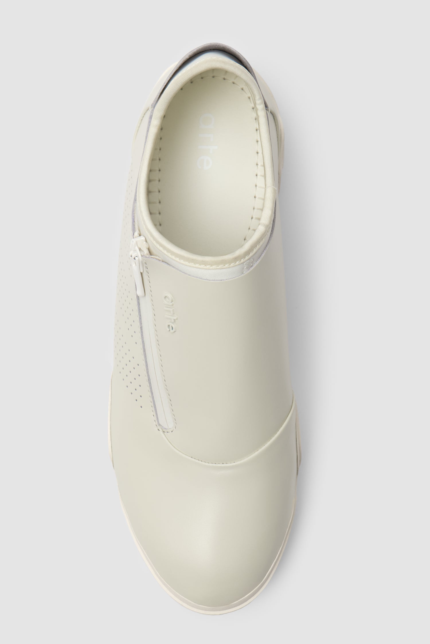 Arte for adidas Trivela in Off White, front view