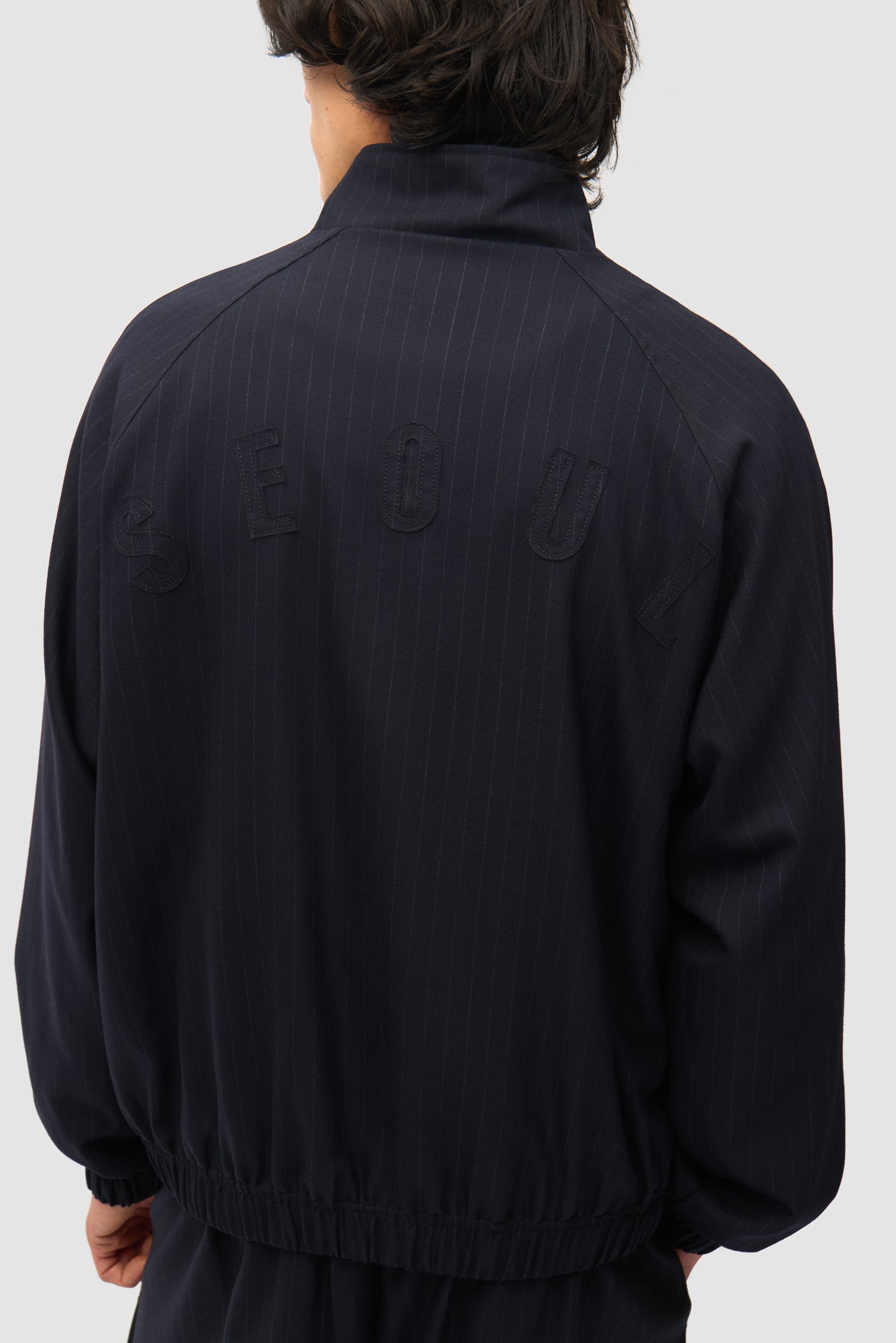 Veste de survêtement à fines rayures