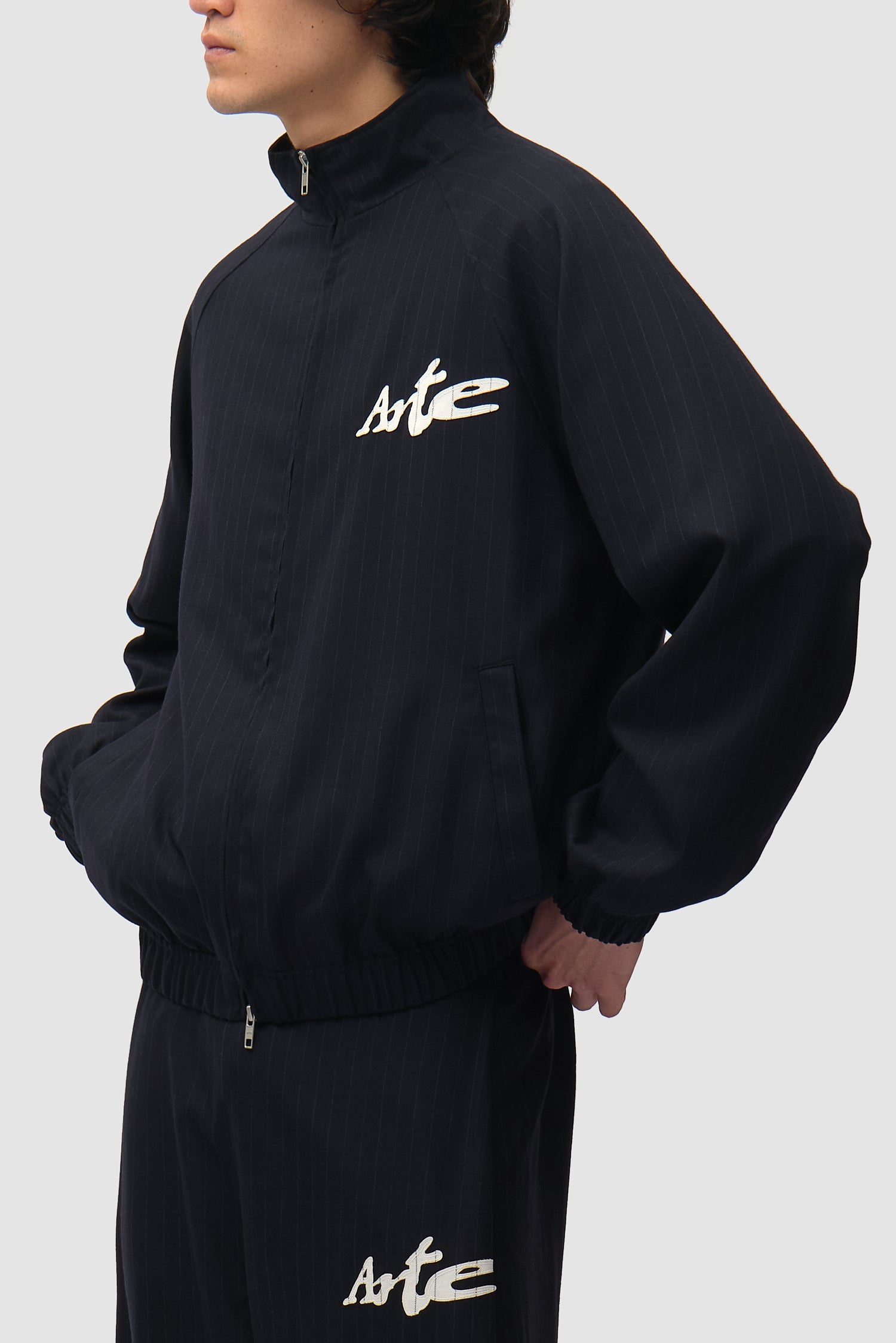 Veste de survêtement à fines rayures