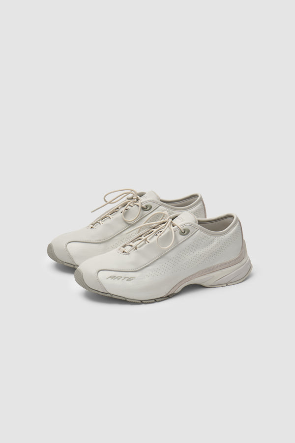 Arte for adidas F50 Crinkle Nylon in White, three-quarter front view