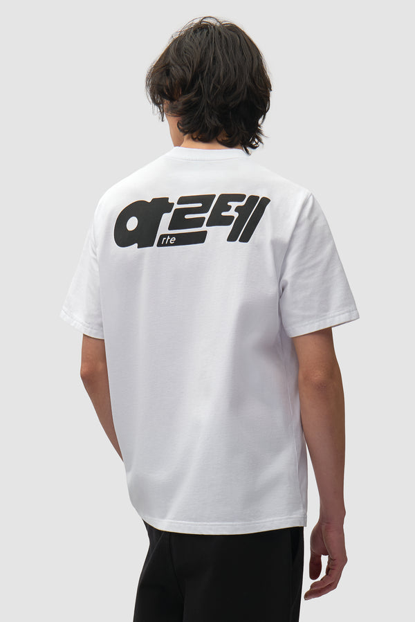 아르테 T-shirt in White worn by a model, half-body back view