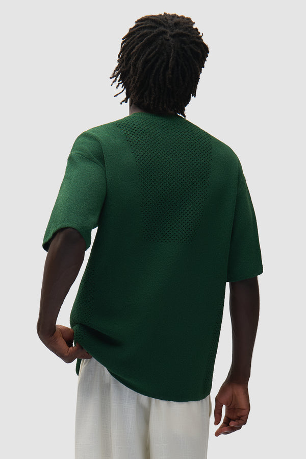 Arte for adidas Knit Jersey in Green worn by a model, half-body back view