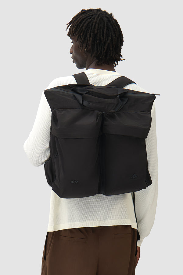 Arte for adidas Bag in Black worn by a model, half-body back view