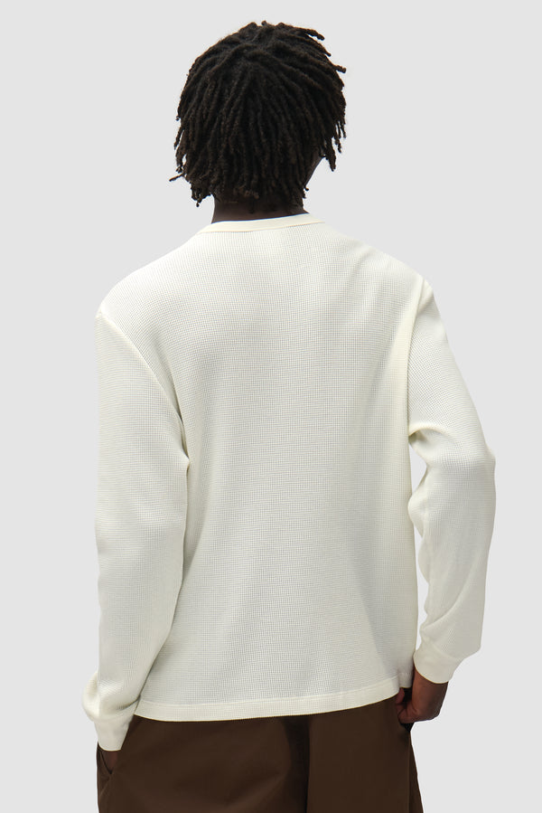 Arte for adidas Henley in Black/White worn by a model, half-body back view