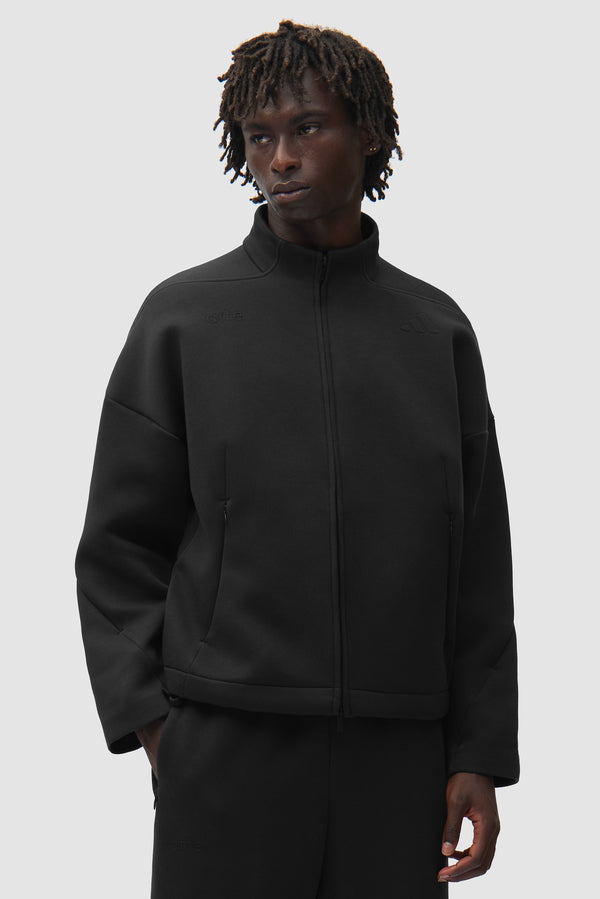 Arte for adidas Z.N.E. Track Jacket in Black worn by a model, half-body front view