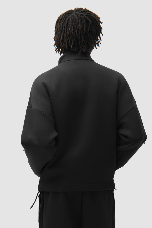 Arte for adidas Z.N.E. Track Jacket in Black worn by a model, half-body back view