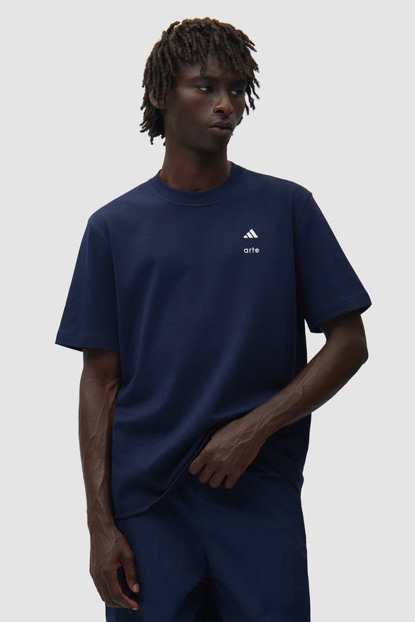 Arte for adidas T-shirt in Navy worn by a model, full-body front view