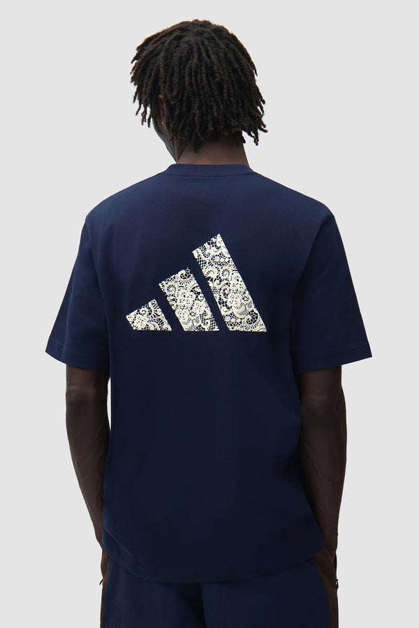 Arte for adidas T-shirt in Navy worn by a model, half-body back view