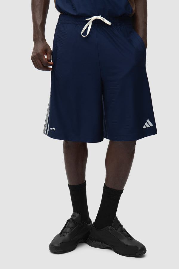 Arte for adidas Shorts in Navy worn by a model, half-body front view