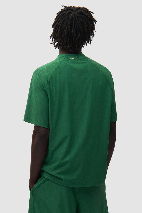 Arte for adidas Jersey in Green worn by a model, half-body back view
