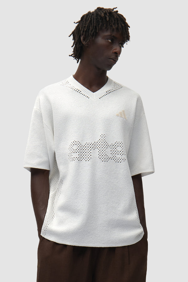 Arte for adidas Knit Jersey in Off White worn by a model, full-body front view