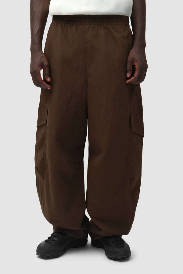 Arte for adidas Cargo Pants in Dust Cargo worn by a model, half-body front view