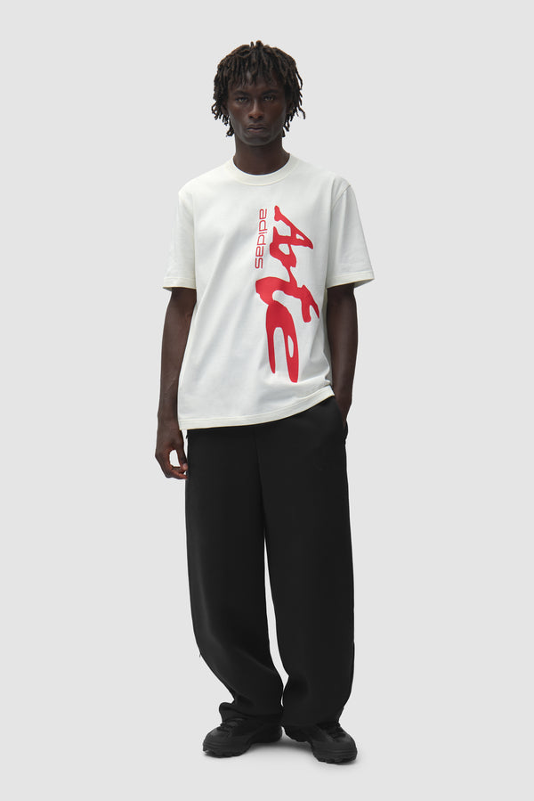 Arte for adidas T-shirt in Off White worn by a model, full-body front view