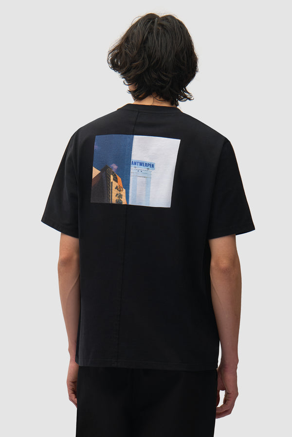 Antwerp/Seoul T-shirt in Black worn by a model, half-body back view