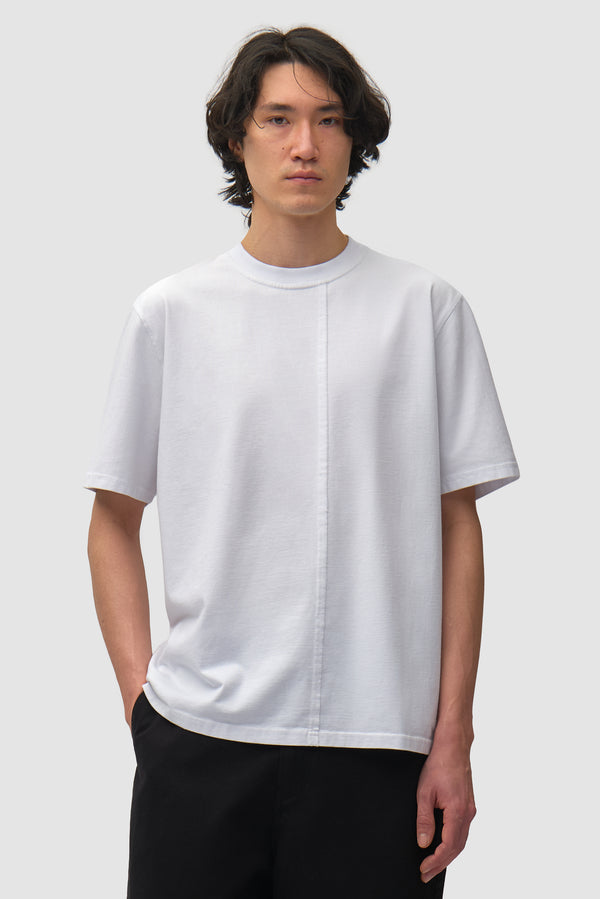 Antwerp/Seoul T-shirt in White worn by a model, half-body front view