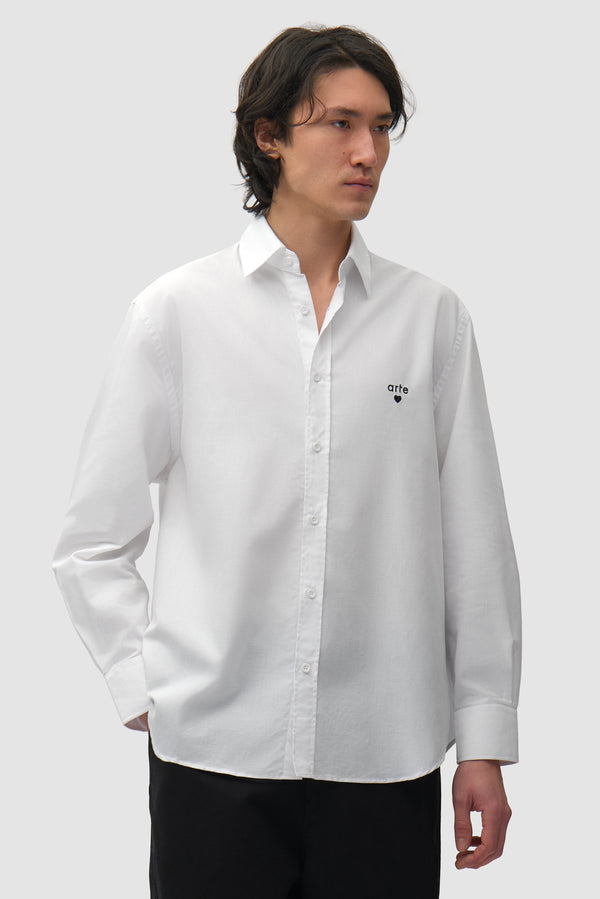 Heart Gallery Shirt in White worn by a model, half-body front view
