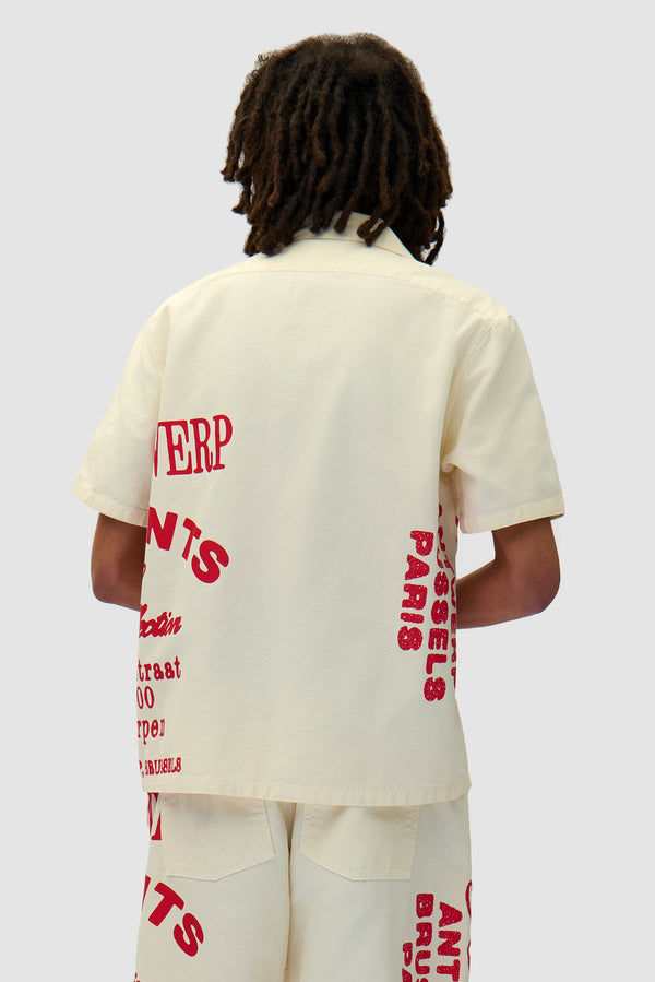 Red Print Shirt in Cream worn by a model, half-body back view