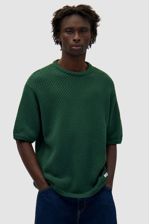 Crochet Knit T-shirt in Green worn by a model, half-body front view