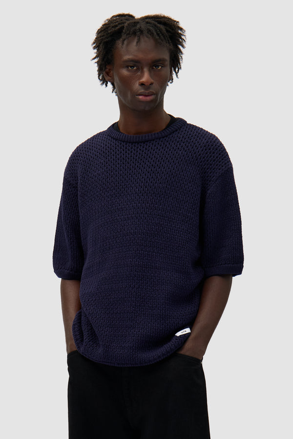 Crochet Knit T-shirt in Navy worn by a model, half-body front view
