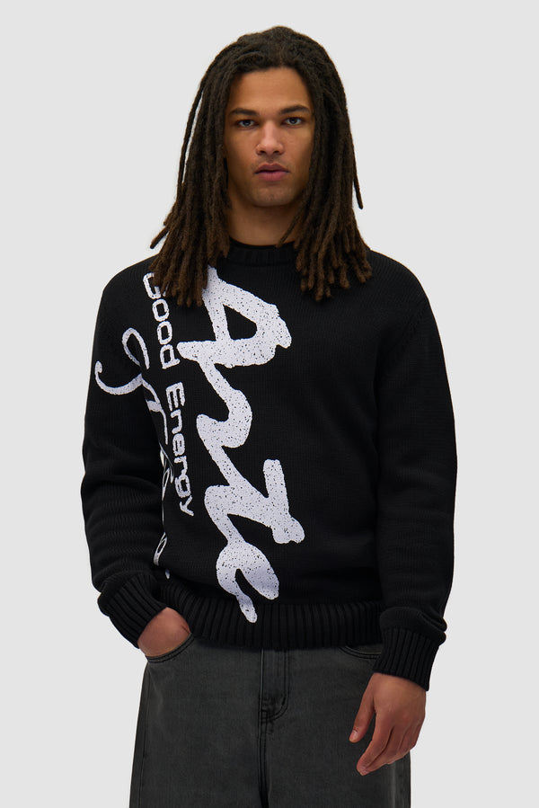 Big Print Knit Sweater in Black worn by a model, half-body front view