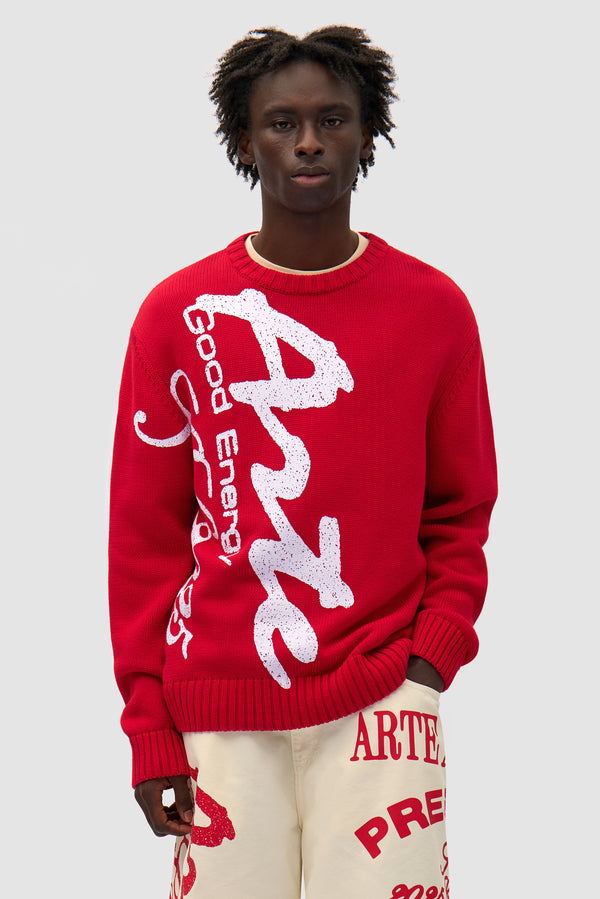 Big Print Knit Sweater in Red worn by a model, half-body front view