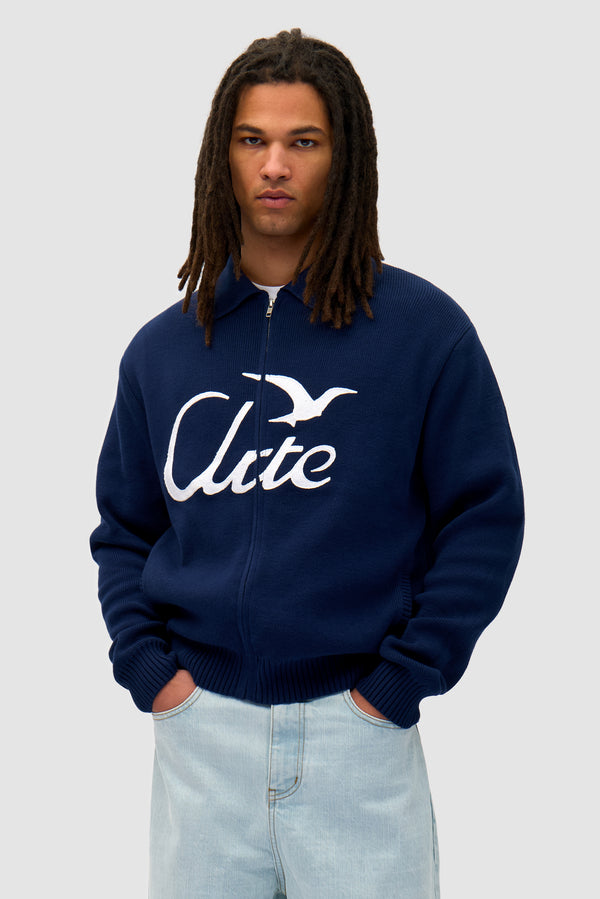 Bird Logo Knit in Navy worn by a model, half-body front view