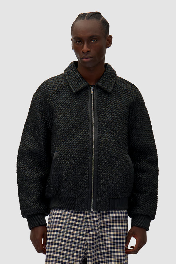Leather Braided Jacket in Black worn by a model, half-body front view