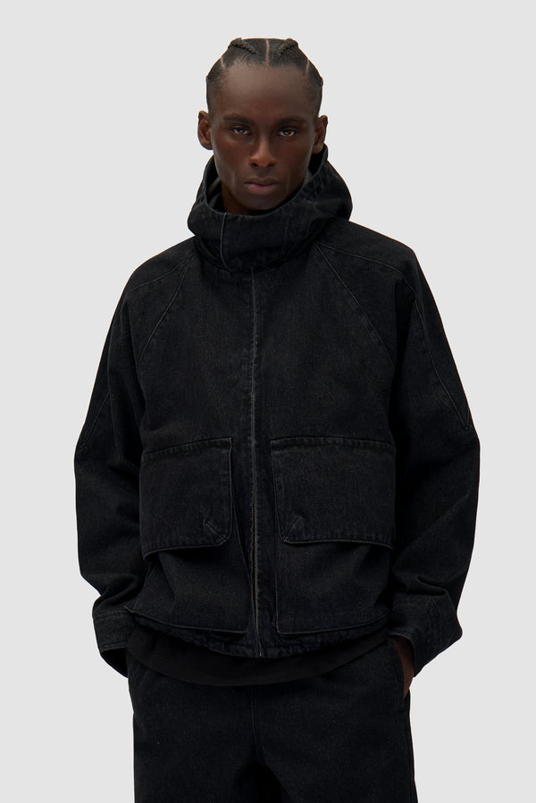 Denim Tech jacket in Black worn by a model, half-body front view