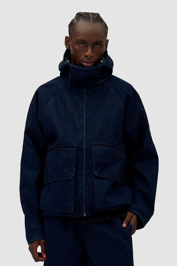Denim Tech jacket in Navy worn by a model, half-body front view