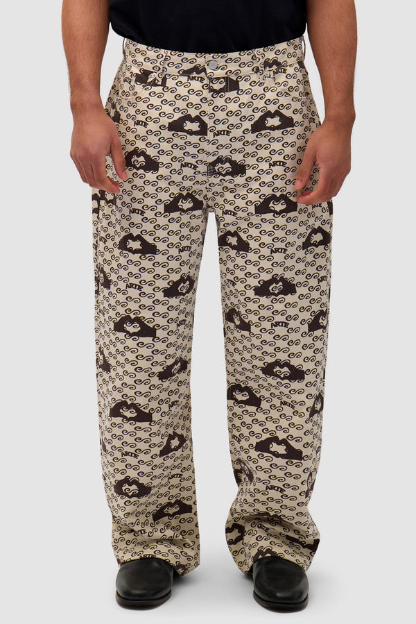 Hand Heart Print Pants in Cream/Brown worn by a model, half-body front view