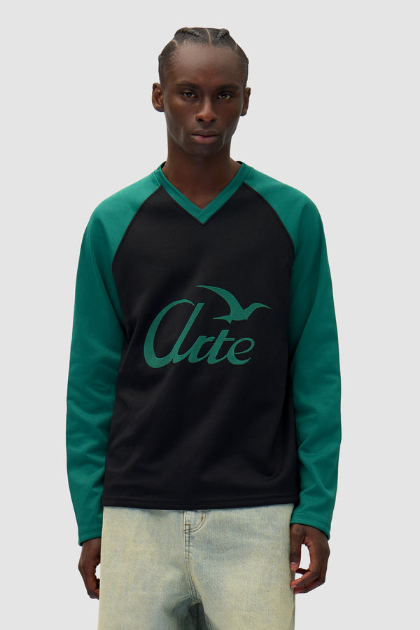 Bird Logo Longsleeve in Green/Black worn by a model, half-body front view