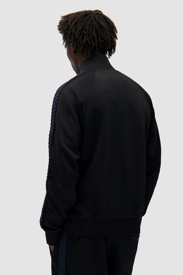Braid Strip Jacket in Black worn by a model, half-body back view