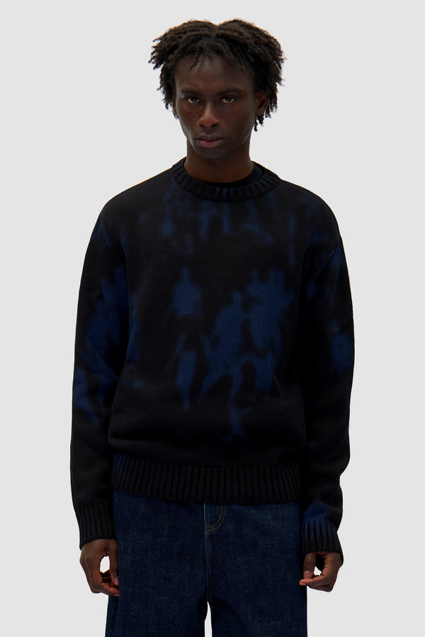People Knit Sweater in Black/Navy worn by a model, half-body front view