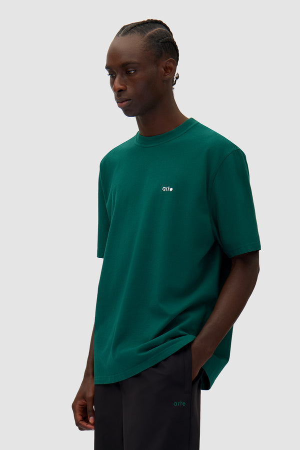 Big Spiral Print T-shirt in Green worn by a model, half-body front view