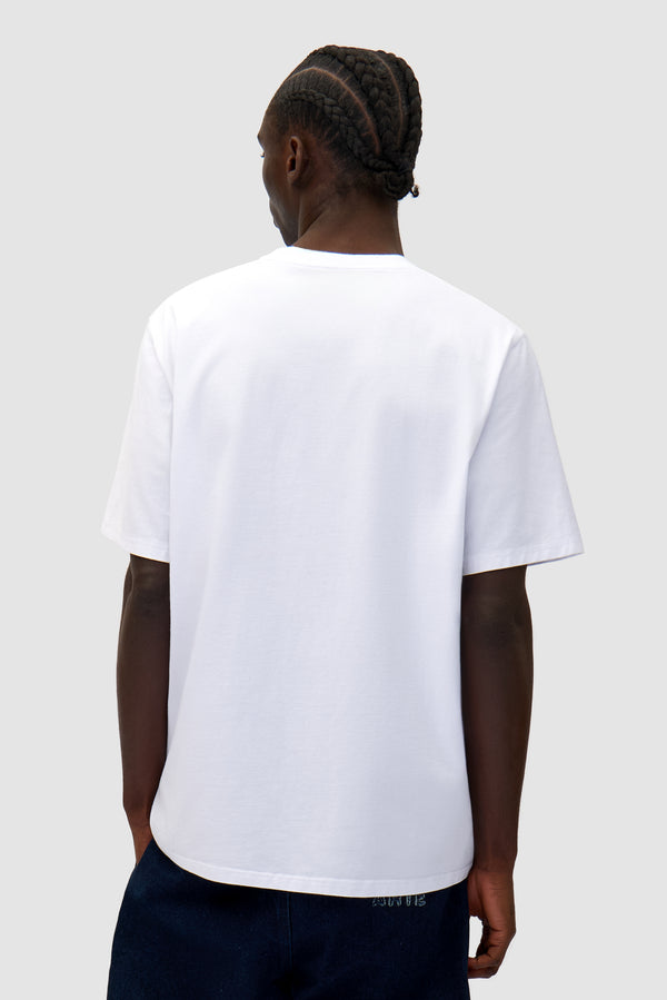 Heart Logo T-shirt in White worn by a model, half-body back view