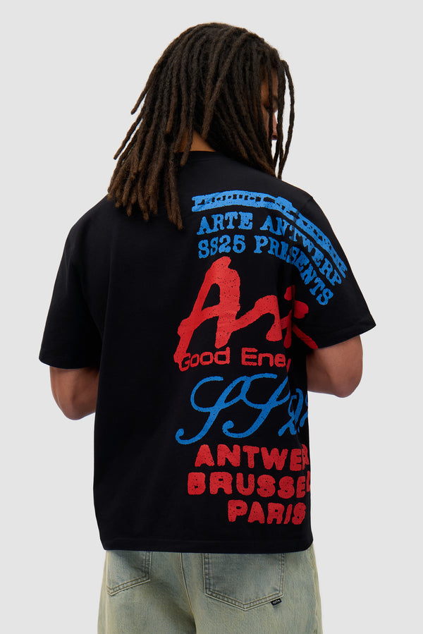 Side Print T-shirt in Black worn by a model, half-body back view