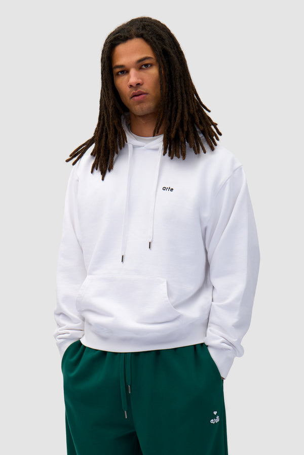 Energy Print Hoodie in White worn by a model, half-body back view