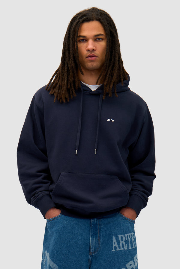 Back Sun & Moon Hoodie in Navy worn by a model, half-body back view