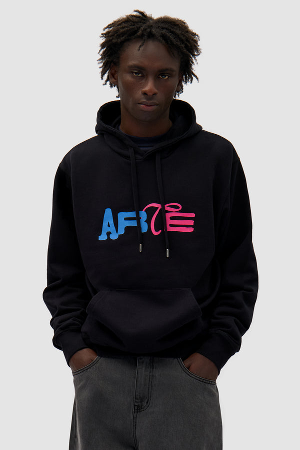 Duo Logo Hoodie in Black worn by a model, half-body front view
