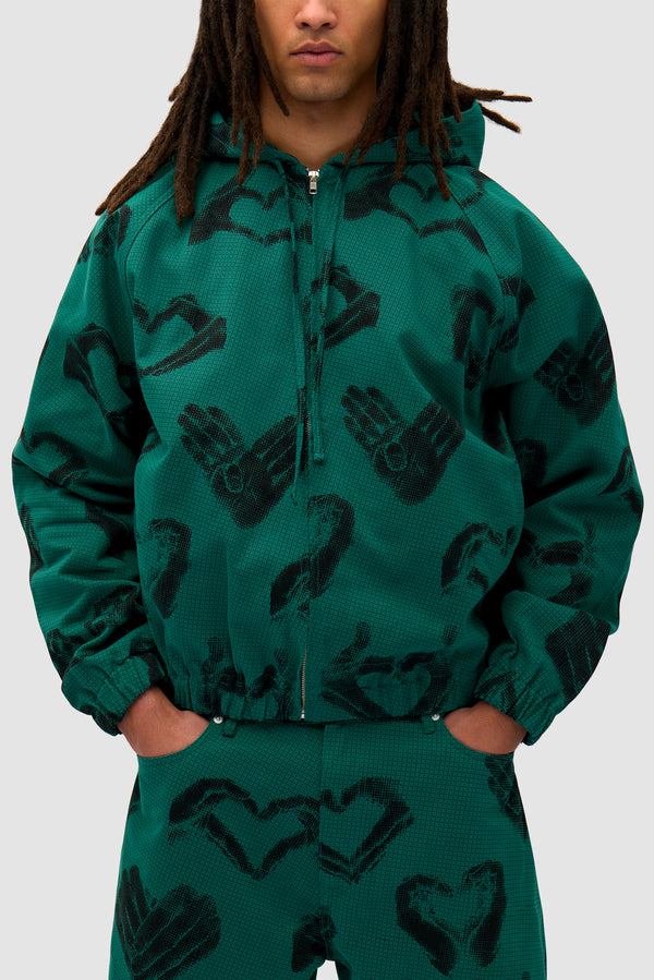 Hands Print Jacket in Green worn by a model, half-body back view