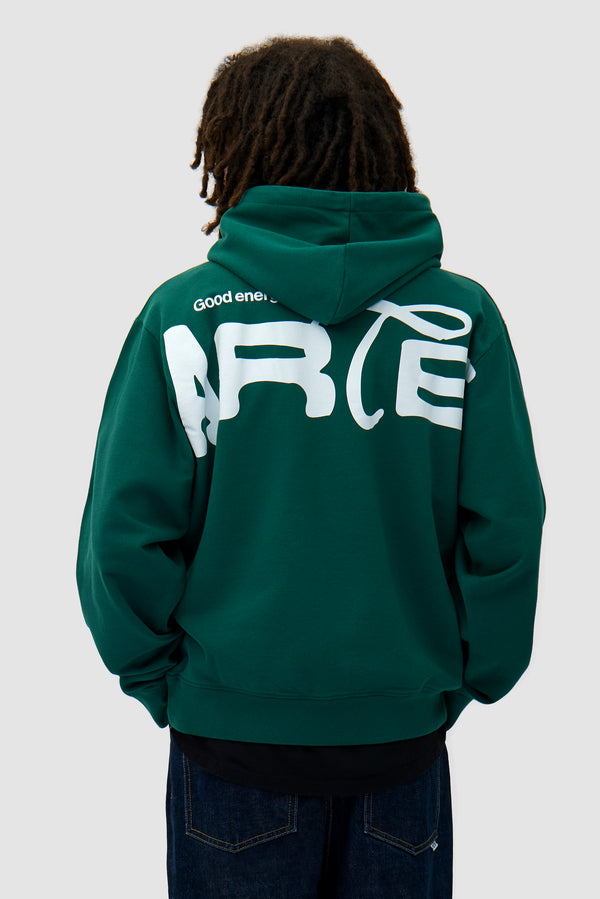 Energy Hoodie in Green worn by a model, half-body front view