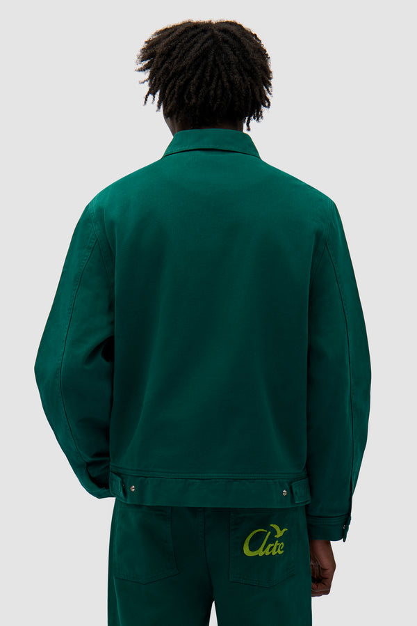Heart Logo Jacket in Green worn by a model, half-body back view