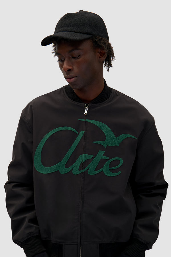 Wool Cap in Black worn by a model, half-body front view