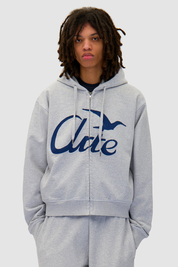 Zipper Hoodie in Grey worn by a model, half-body front view